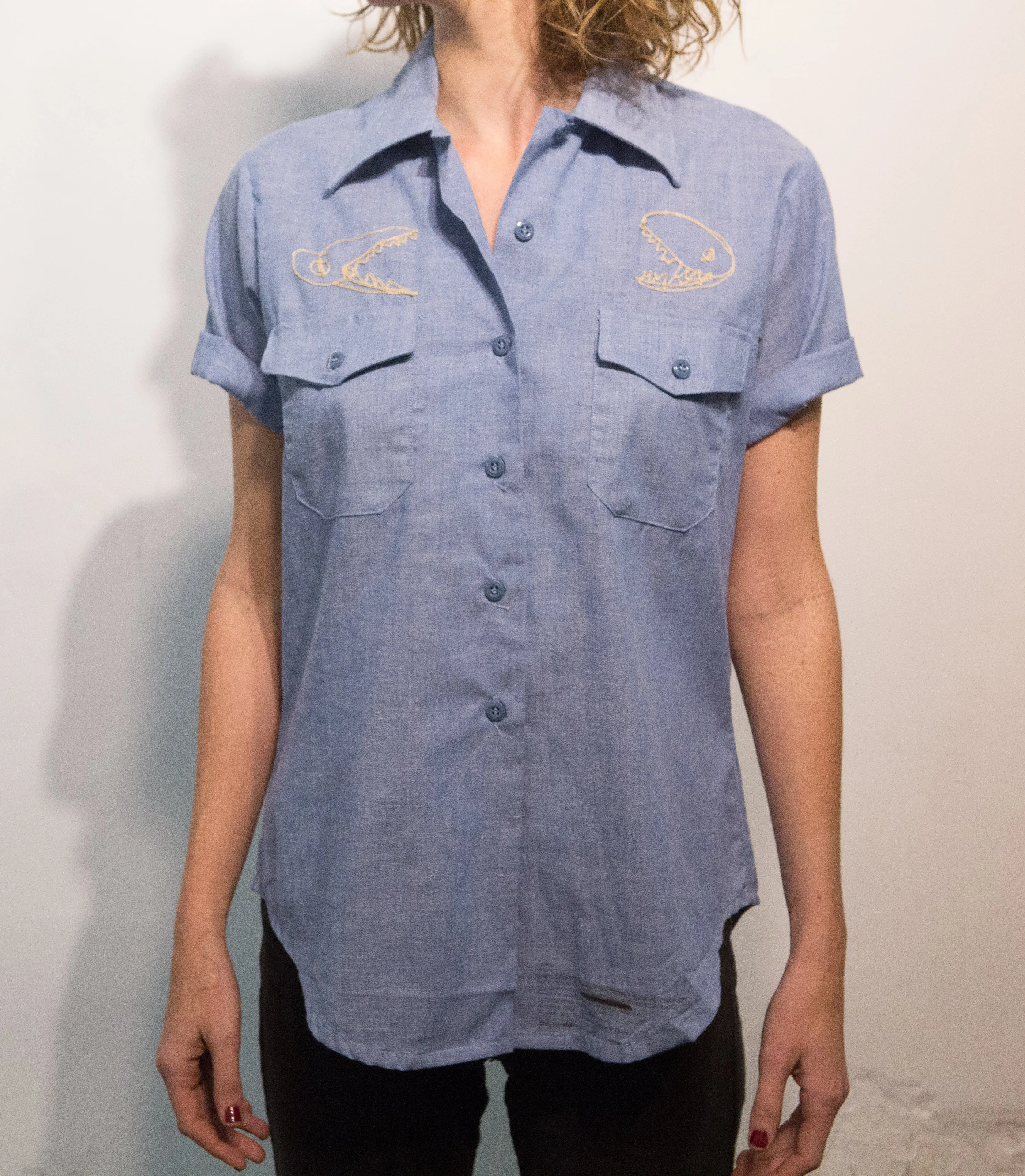 Short sleeve chambray button up: hammerhead and dino skulls