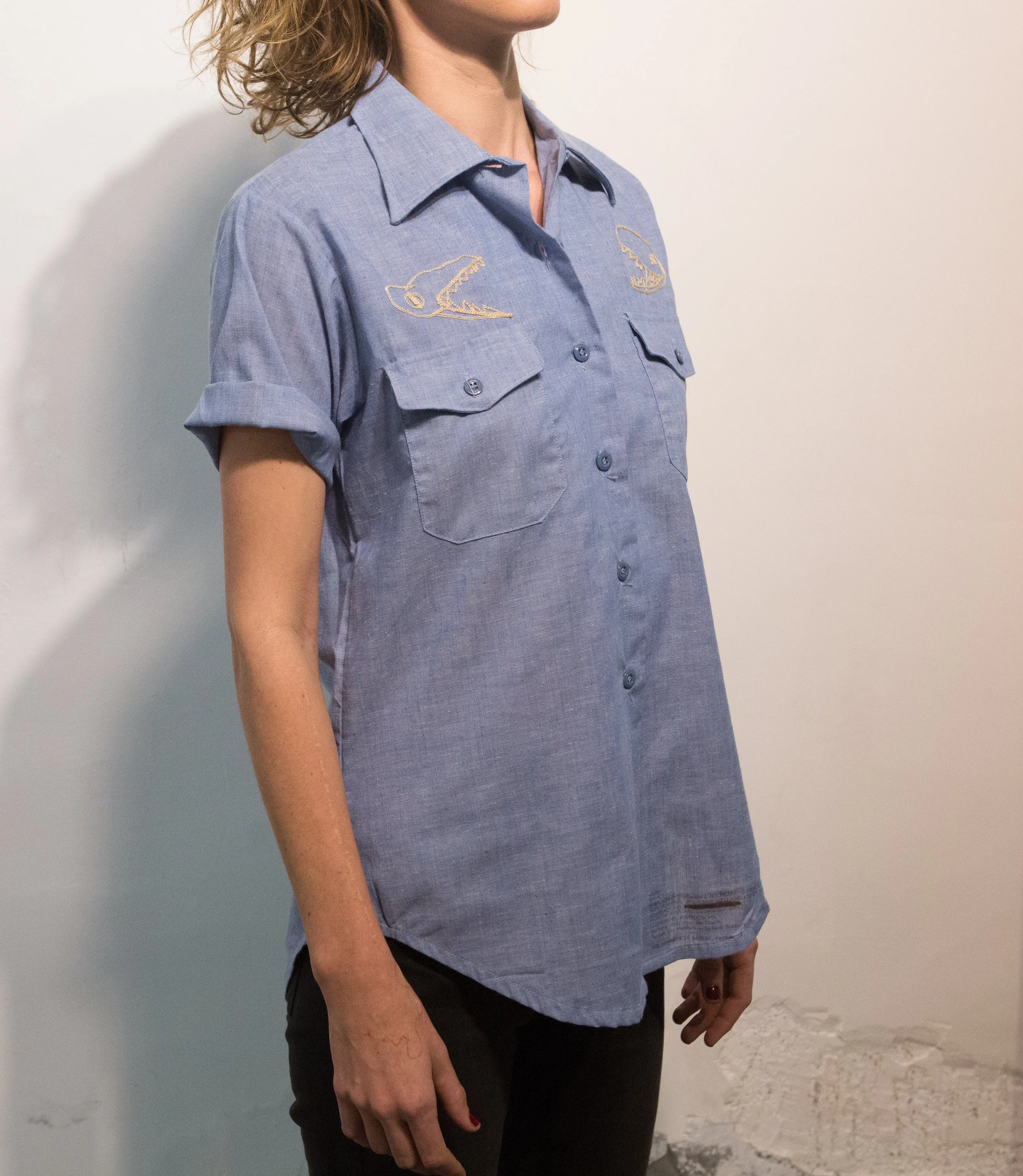 Short sleeve chambray button up: hammerhead and dino skulls